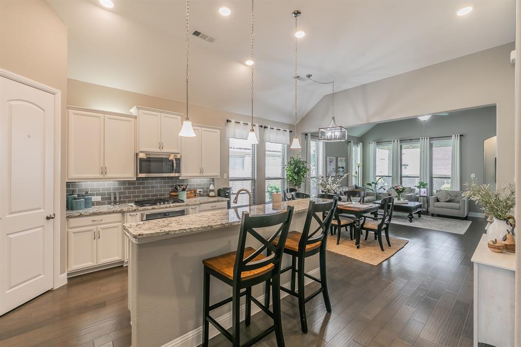 14804 Cedar Flat Way Fort Worth, TX 76262 - Photo 3 of 35 a kitchen with lots of white furniture appliances and wooden floor