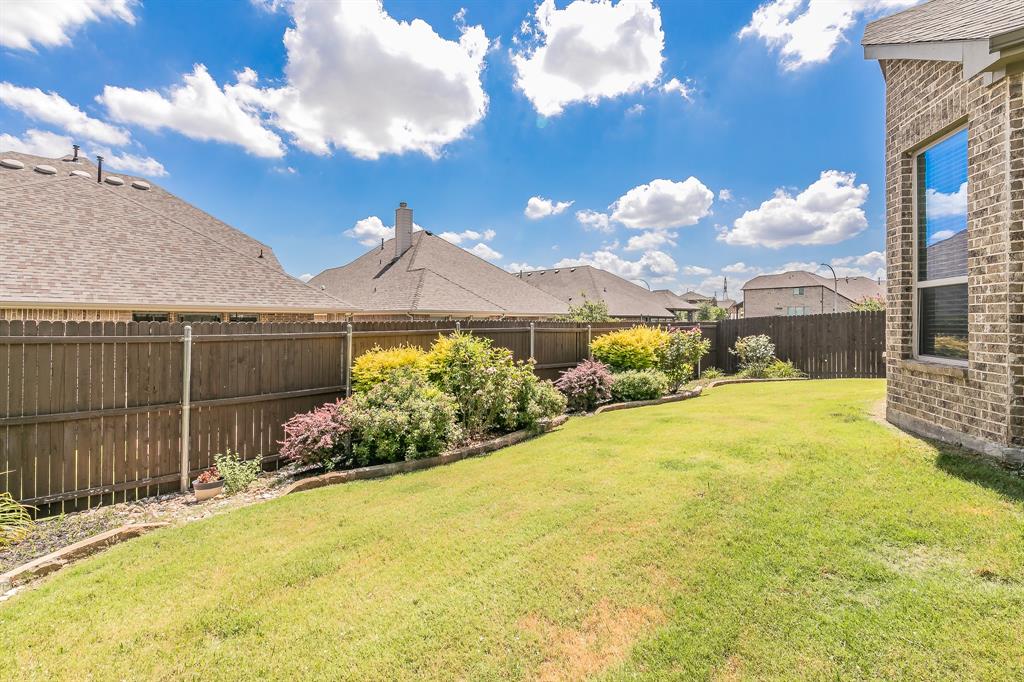 14804 Cedar Flat Way Fort Worth, TX 76262 - Photo 35 of 35 a view of a garden with a small pool