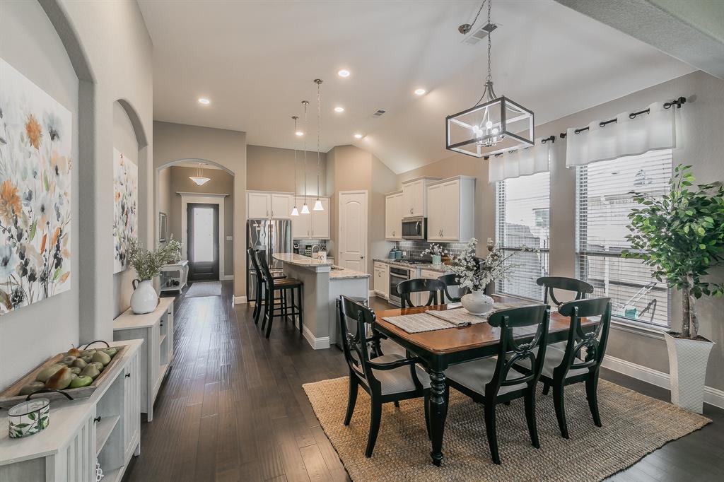 14804 Cedar Flat Way Fort Worth, TX 76262 - Photo 6 of 35 a view of a dining room with furniture and wooden floor