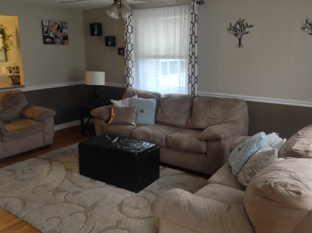 61 Tioga Street Springfield, MA 01128 - Photo 8 of 20 a living room with furniture and a window