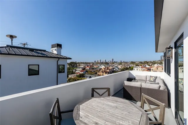 a view of a balcony with chairs