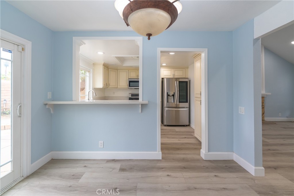 31 Carson Irvine, CA 92620 - Photo 12 of 50 a view of a big room with wooden floor and cabinet
