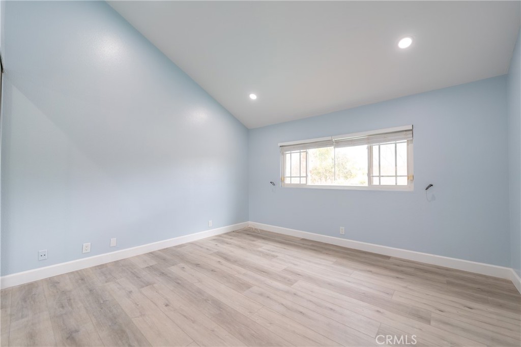 31 Carson Irvine, CA 92620 - Photo 24 of 50 an empty room with wooden floor and windows