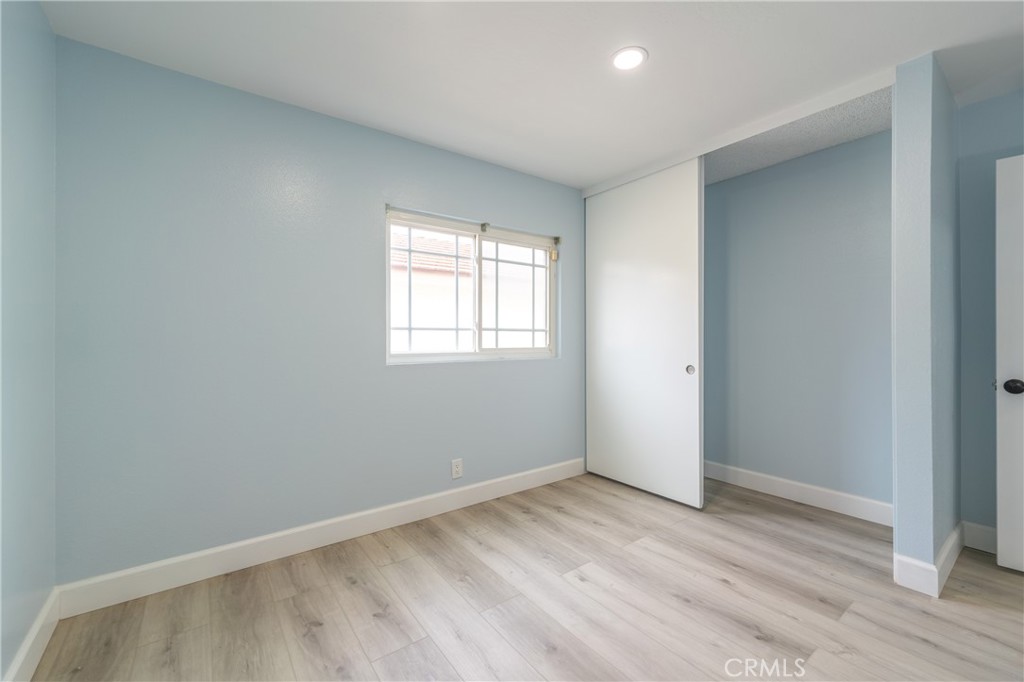 31 Carson Irvine, CA 92620 - Photo 33 of 50 an empty room with wooden floor and windows