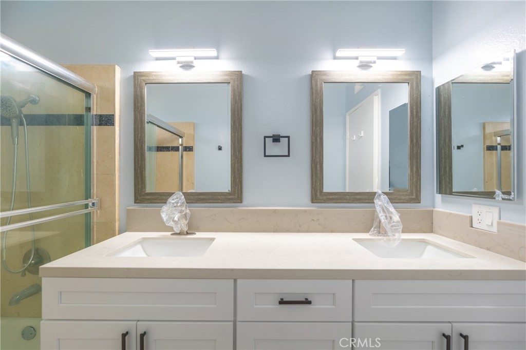 31 Carson Irvine, CA 92620 - Photo 39 of 50 a bathroom with a sink and a mirror