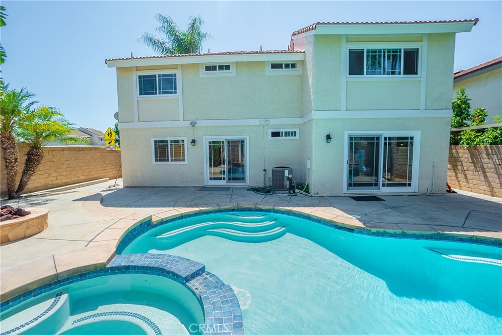 31 Carson Irvine, CA 92620 - Photo 42 of 50 a view of a house with a swimming pool