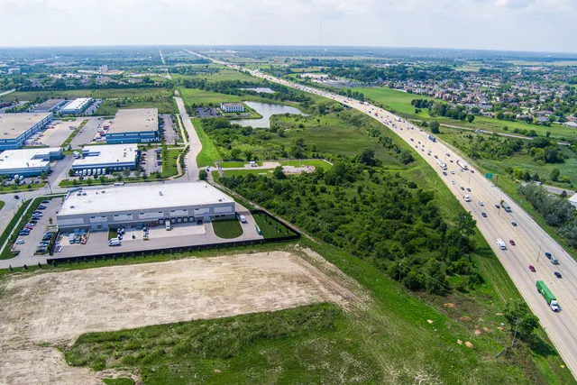 a view of a city with tall buildings
