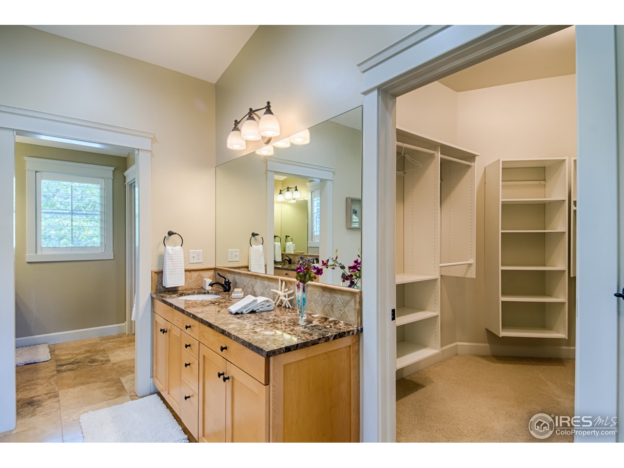 1412 North Street Boulder, CO 80304 - Photo 21 of 39 a bathroom with a granite countertop sink and a mirror