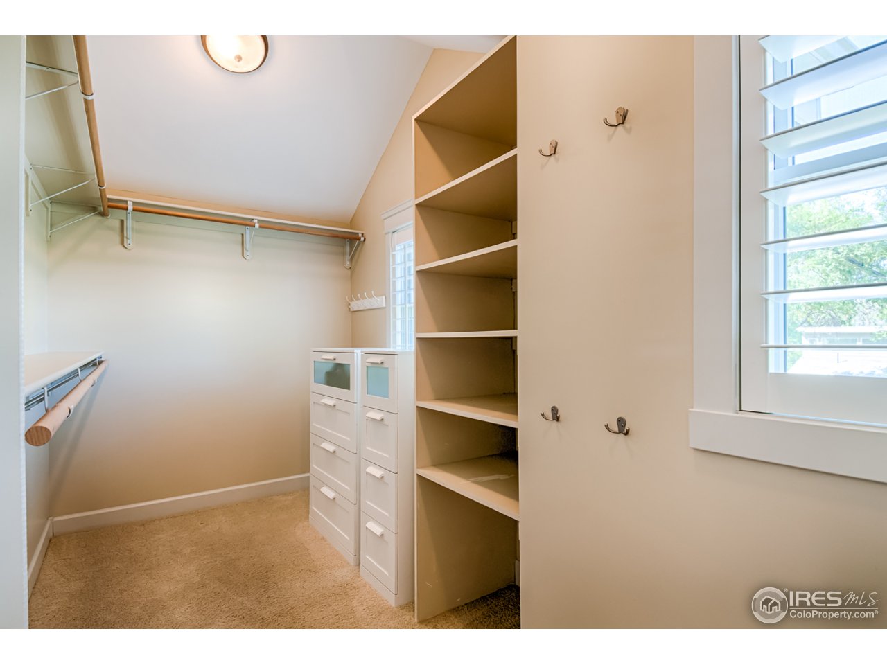 1412 North Street Boulder, CO 80304 - Photo 23 of 39 a view of walk in closet with empty racks