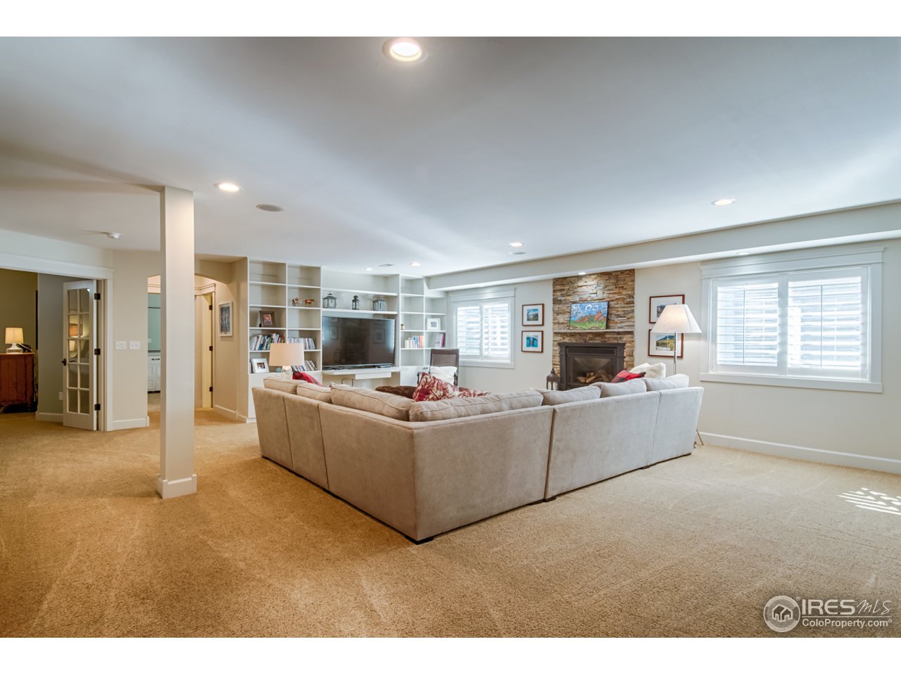 1412 North Street Boulder, CO 80304 - Photo 27 of 39 a living room with furniture and a flat screen tv