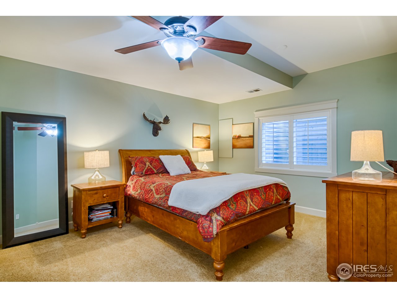 1412 North Street Boulder, CO 80304 - Photo 31 of 39 a bed room with a bed and a chandelier