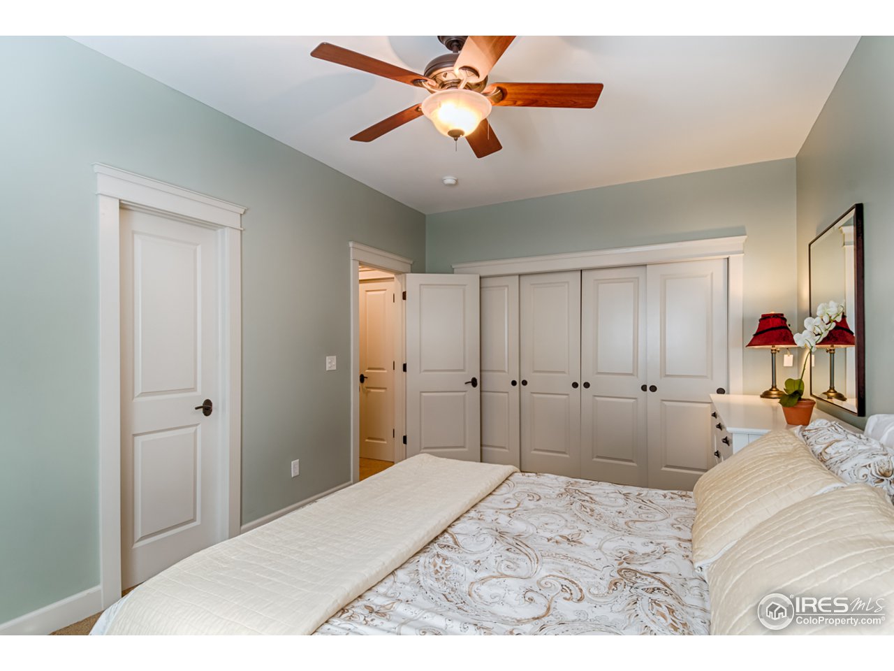 1412 North Street Boulder, CO 80304 - Photo 33 of 39 a bed room with a bed and a ceiling fan