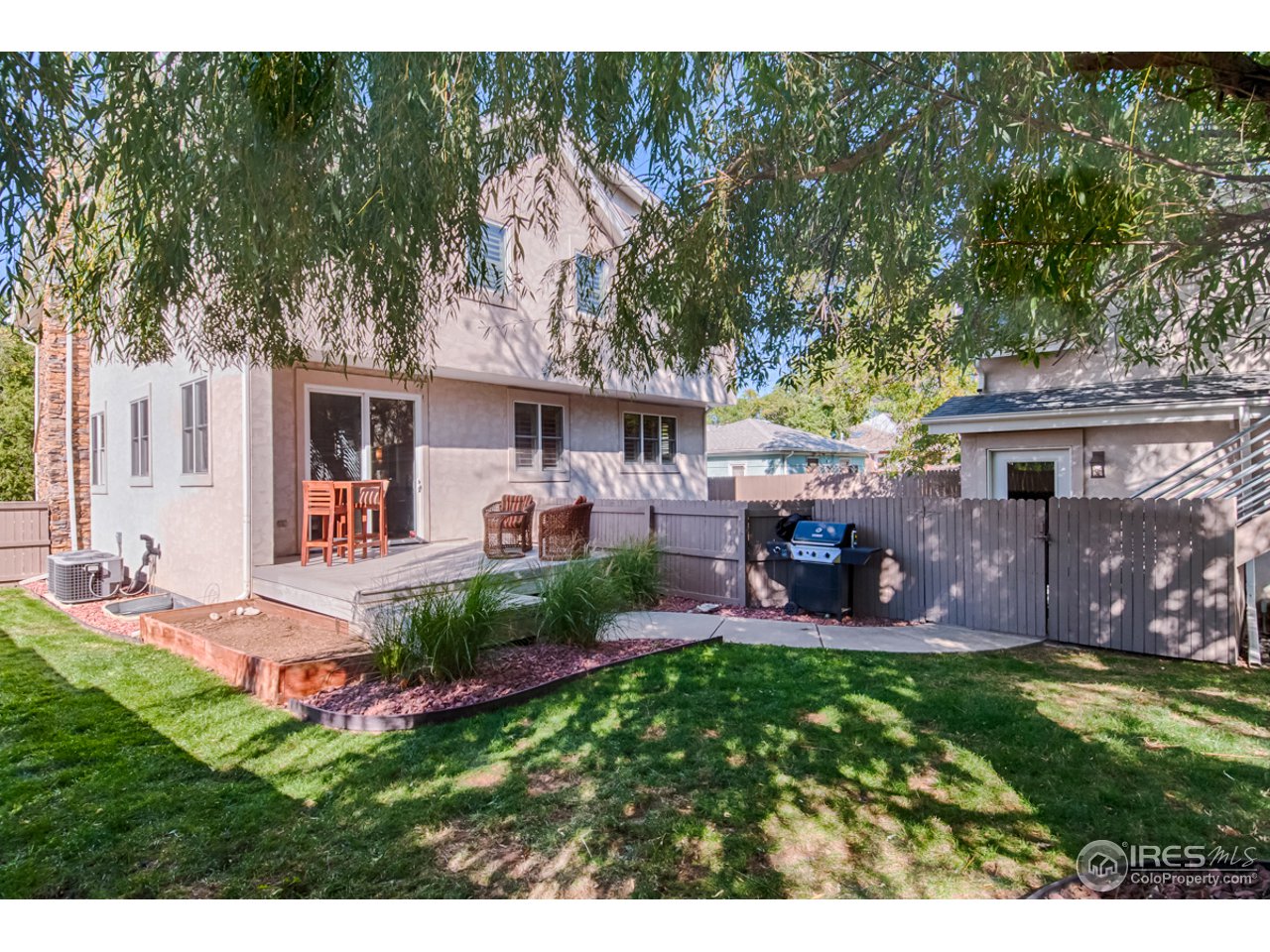 1412 North Street Boulder, CO 80304 - Photo 37 of 39 a view of a house with a yard porch and sitting area