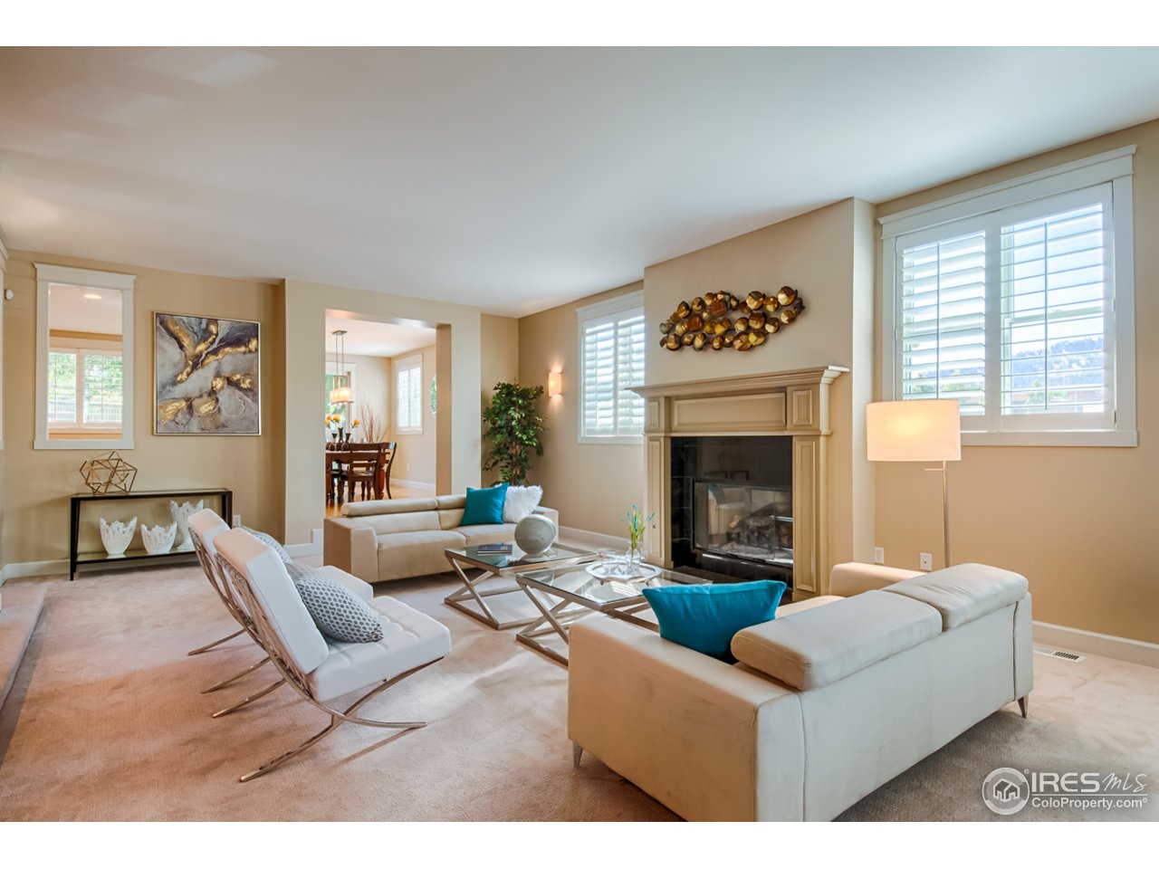1412 North Street Boulder, CO 80304 - Photo 5 of 39 a living room with furniture and a fireplace