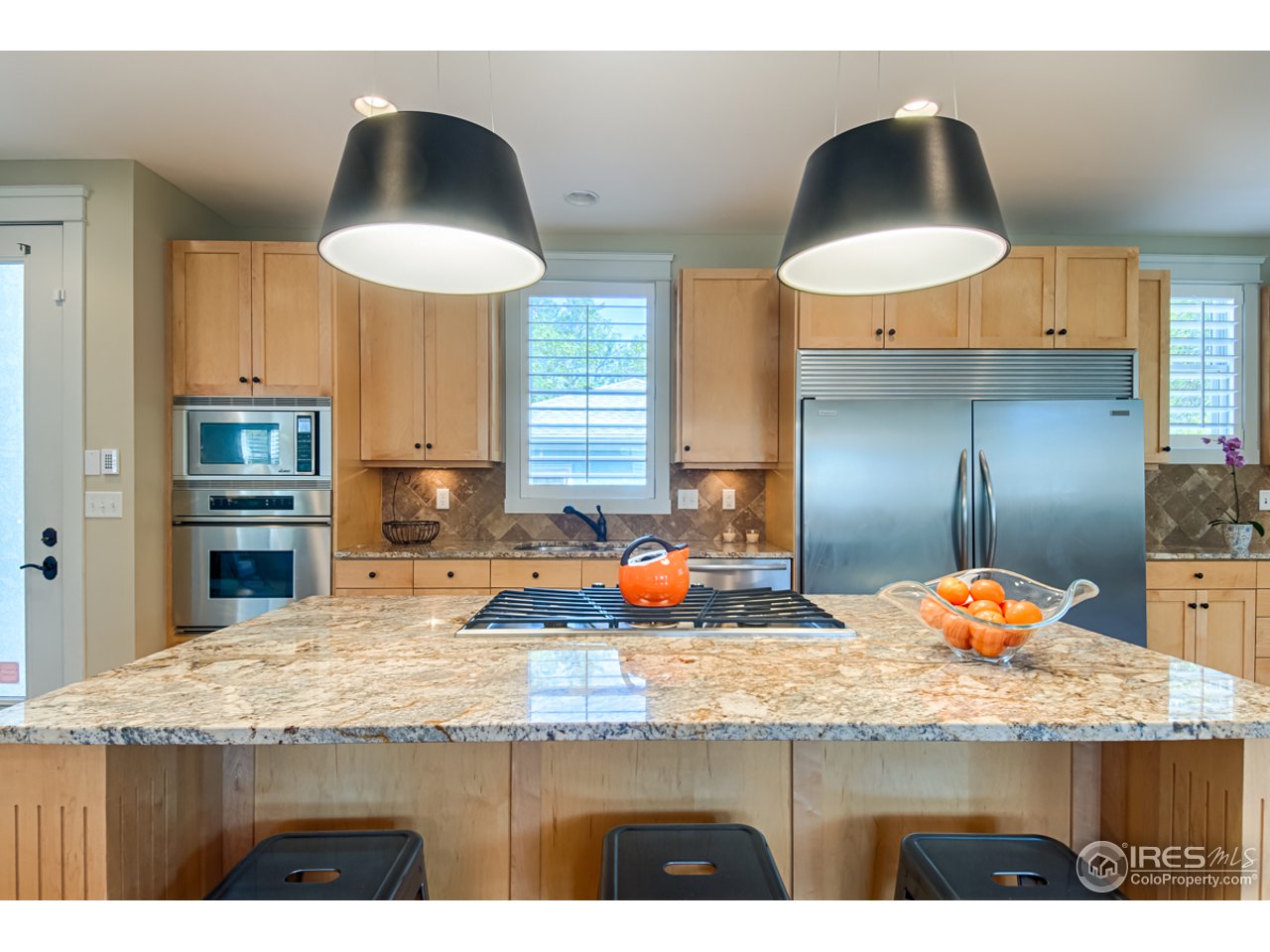1412 North Street Boulder, CO 80304 - Photo 8 of 39 a kitchen with stainless steel appliances granite countertop a sink a stove and a refrigerator
