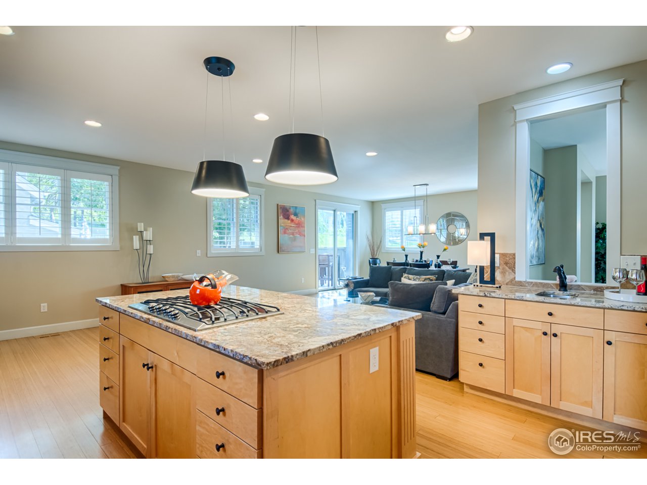 1412 North Street Boulder, CO 80304 - Photo 10 of 39 a kitchen with kitchen island granite countertop a sink cabinets and window