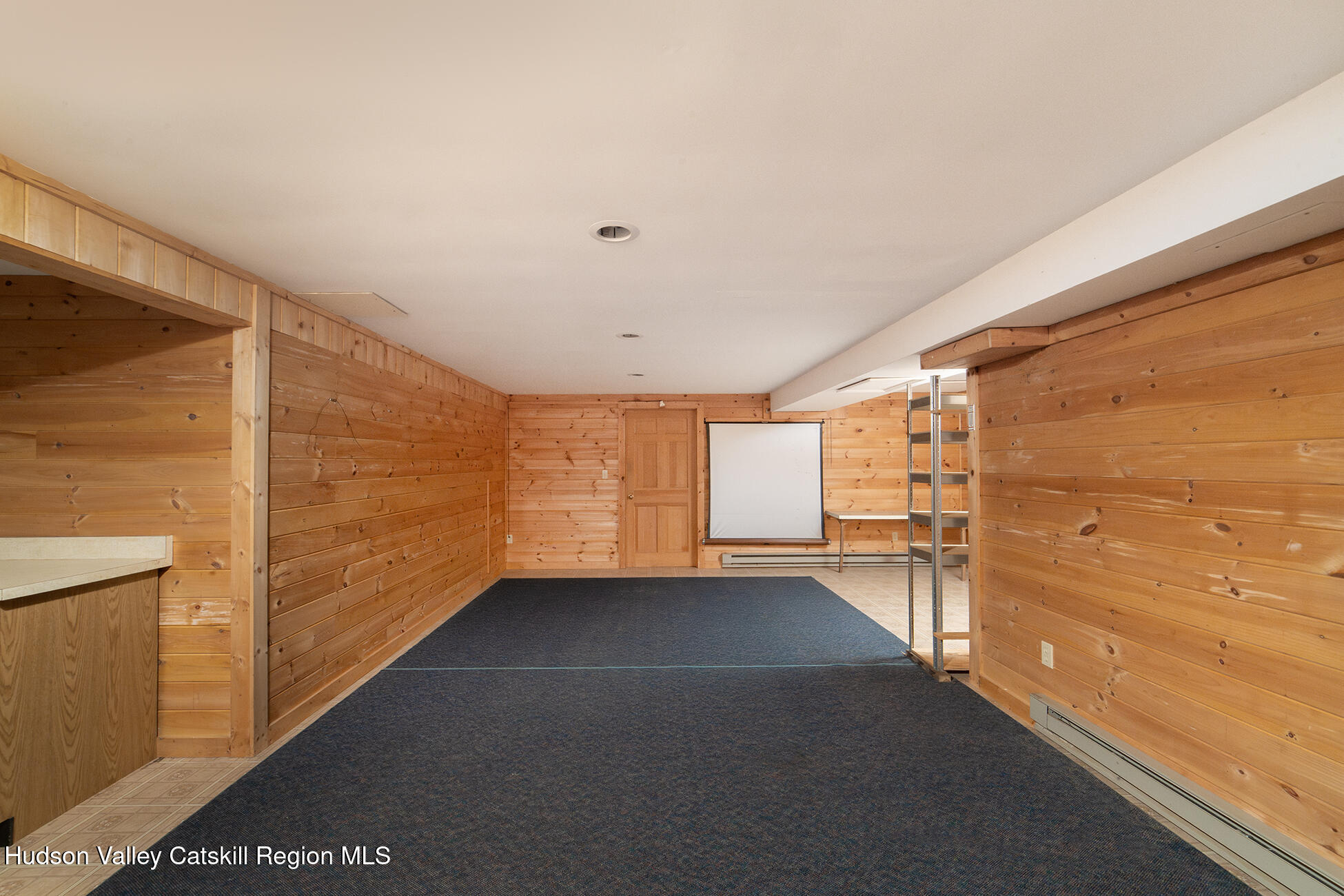 317 Mountain View Road Copake, NY 12516 - Photo 22 of 27 a view of empty room with wooden floor and fan