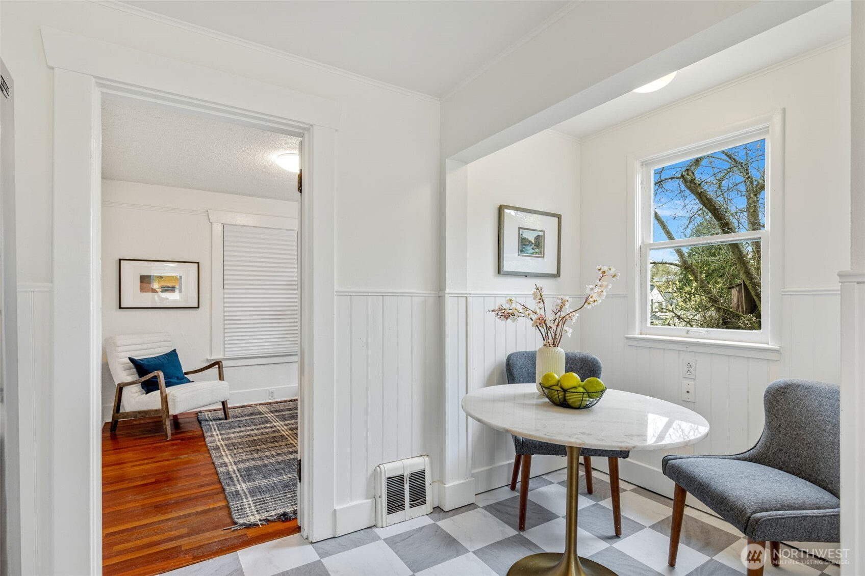 5812 46th Avenue South Seattle, WA 98118 - Photo 17 of 40 a living room with furniture and wooden floor