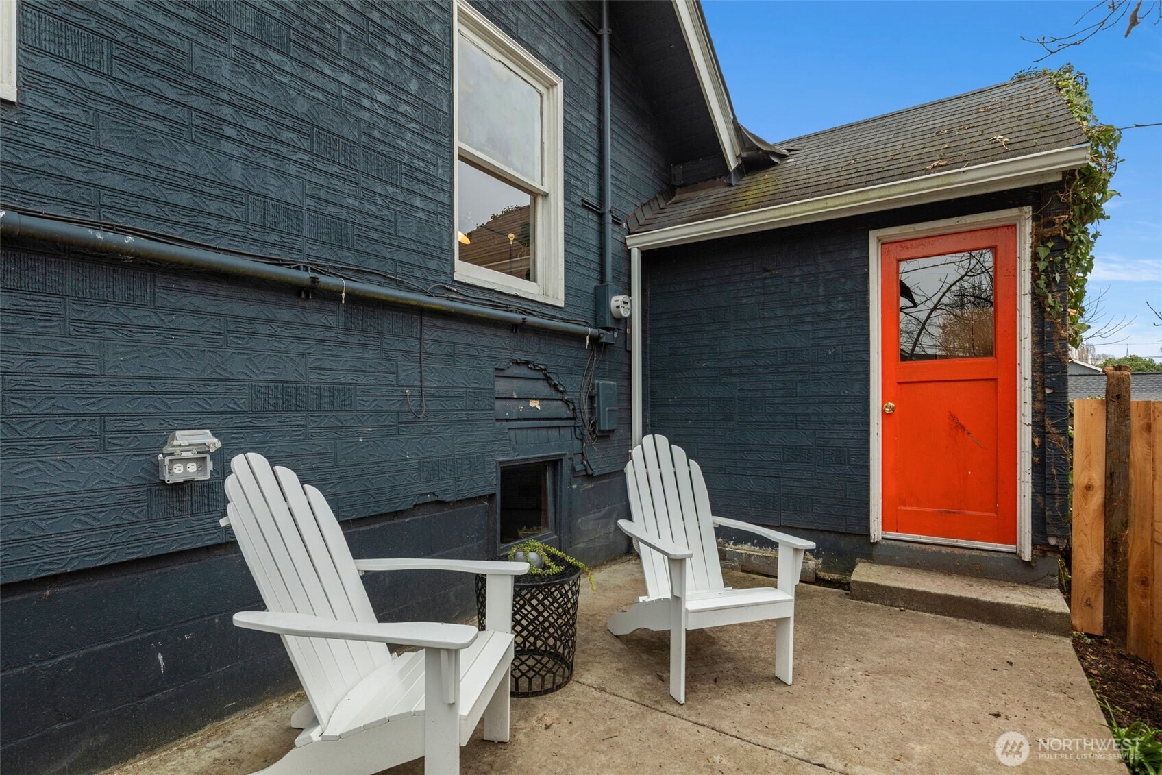5812 46th Avenue South Seattle, WA 98118 - Photo 34 of 40 a wooden bench sitting in front of a building