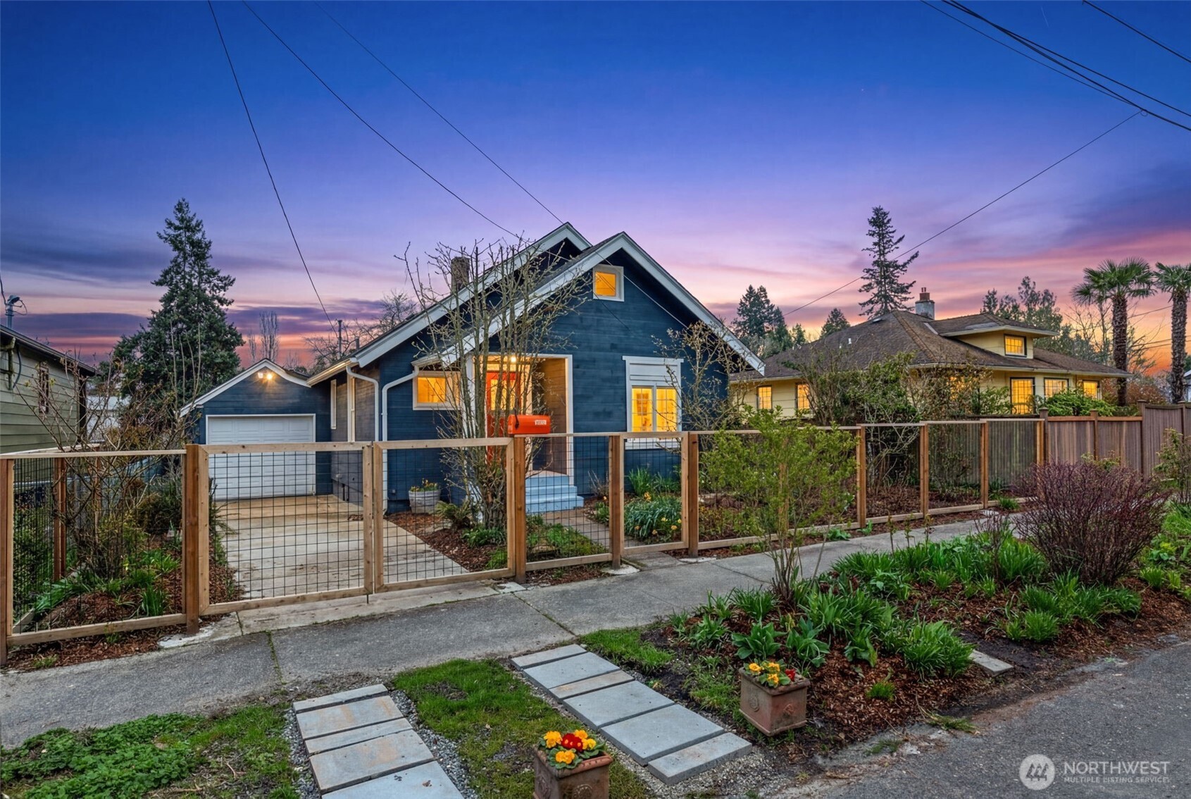 5812 46th Avenue South Seattle, WA 98118 - Photo 39 of 40 a front view of a house with garden