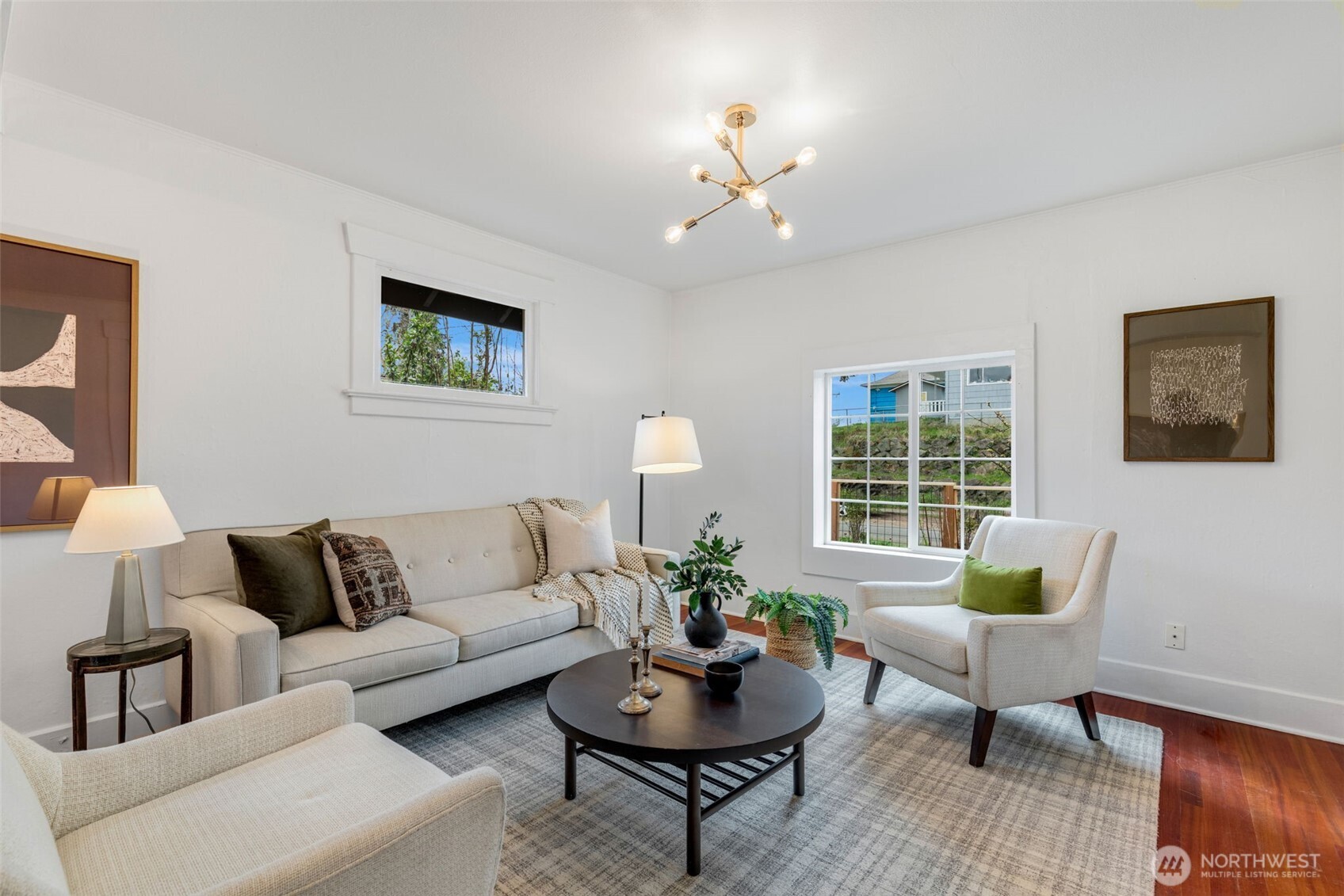 5812 46th Avenue South Seattle, WA 98118 - Photo 6 of 40 a living room with furniture and a potted plant