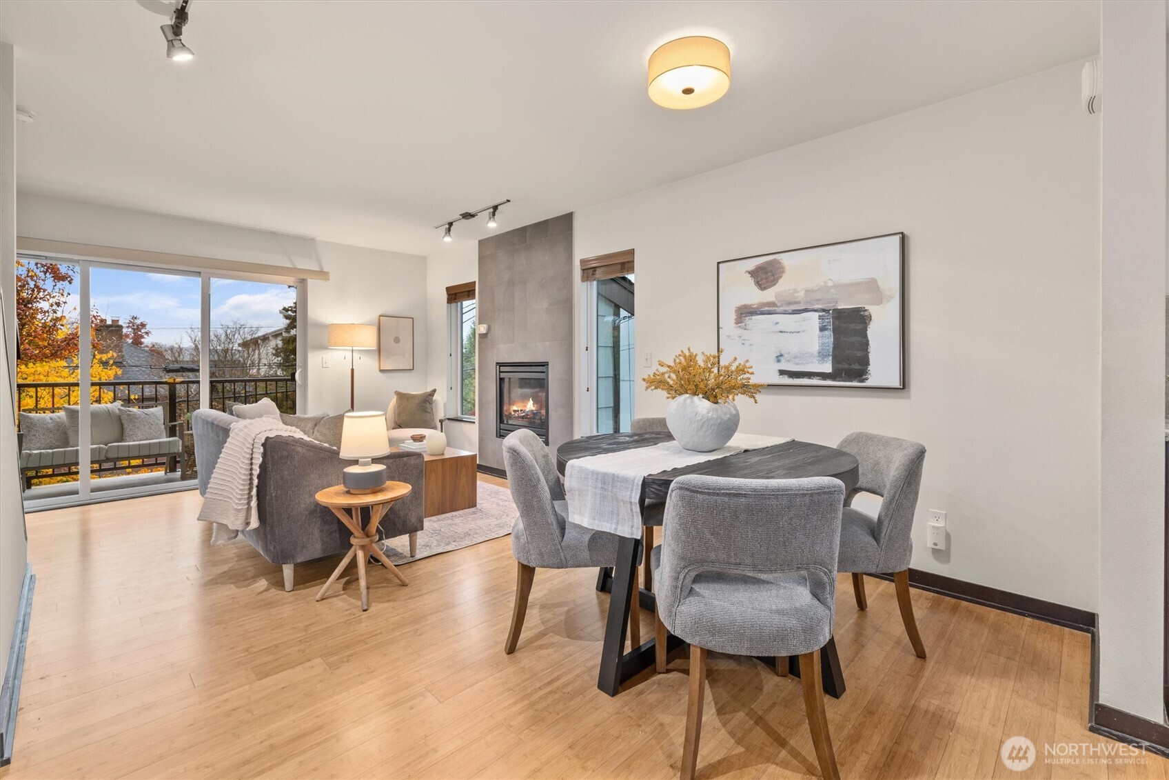 2516 Yale Avenue East, Unit C Seattle, WA 98102 - Photo 10 of 37 a dining room with furniture and wooden floor