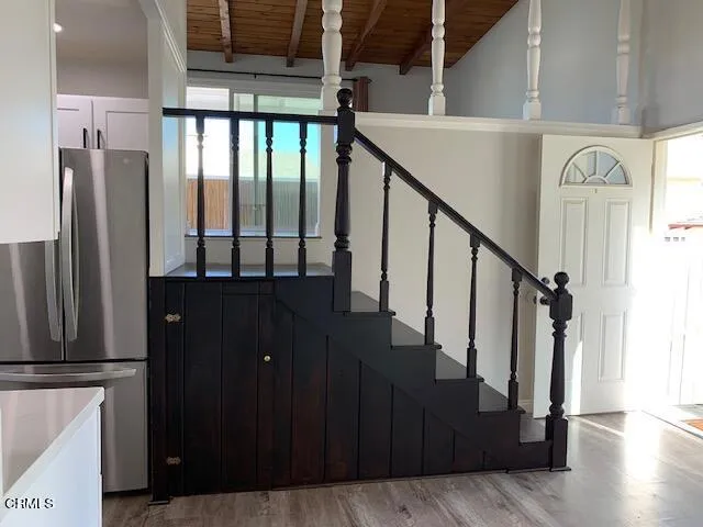 a view of entryway with wooden floor