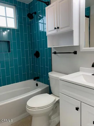 a bathroom with a toilet and a sink