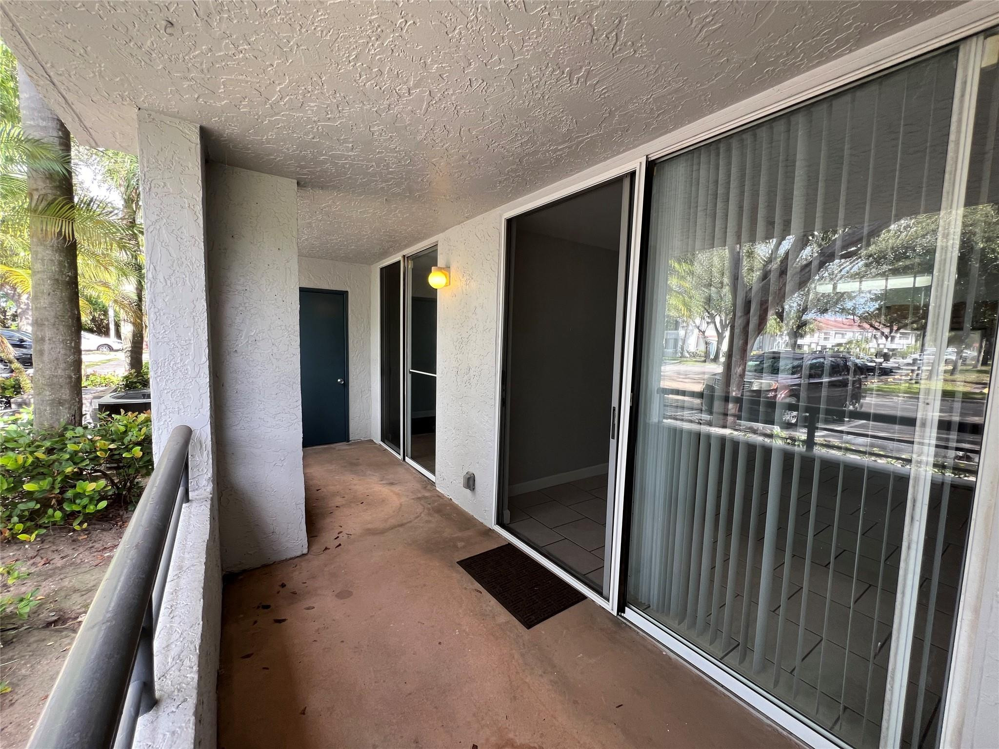 921 Lyons Road, Unit 3105 Coconut Creek, FL 33063 - Photo 13 of 28 a view of a balcony