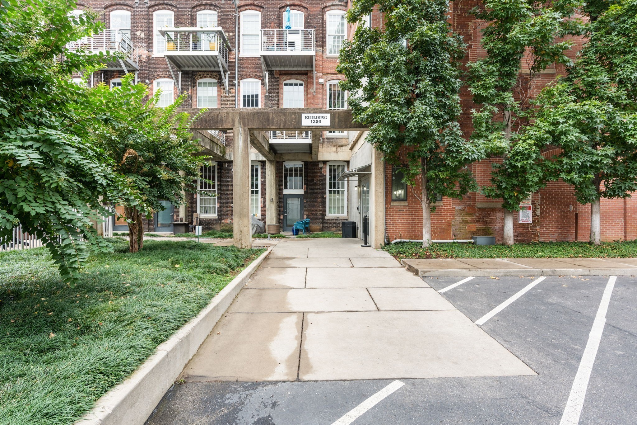 1350 Rosa L Parks Boulevard, Unit 347 Nashville, TN 37208 - Photo 16 of 27 a view of a building with a yard