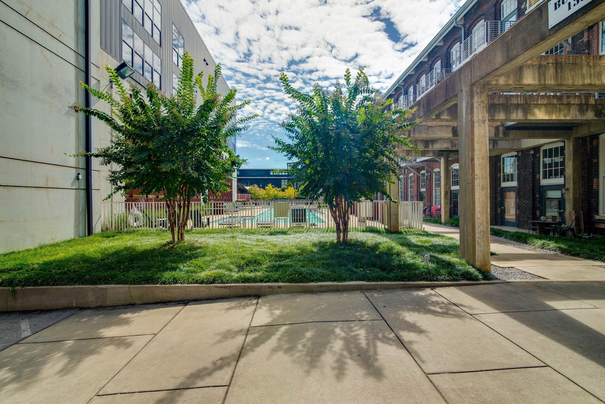 1350 Rosa L Parks Boulevard, Unit 347 Nashville, TN 37208 - Photo 25 of 27 a view of a pathway both side of a building