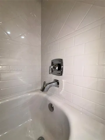 a bathroom with a tub