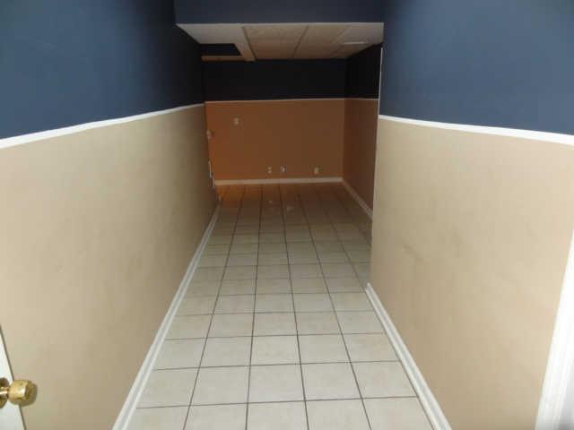 1052 Shadowbrook Drive Greenbrier, TN 37073 - Photo 11 of 20 Large entry area in the basement from the garage. Tile floors for those messy days, easy to clean. 2 car garage also has extra storage area.