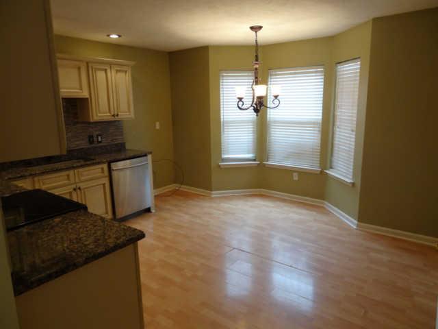 1052 Shadowbrook Drive Greenbrier, TN 37073 - Photo 5 of 20 Soothing colors in kitchen and bay window lets in lots of light to the eating area. Kitchen has a pantry as well.