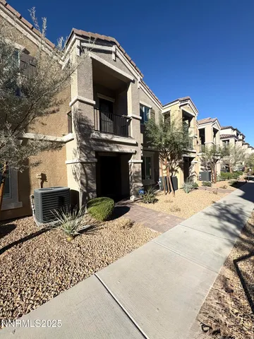 a view of a backyard of the house