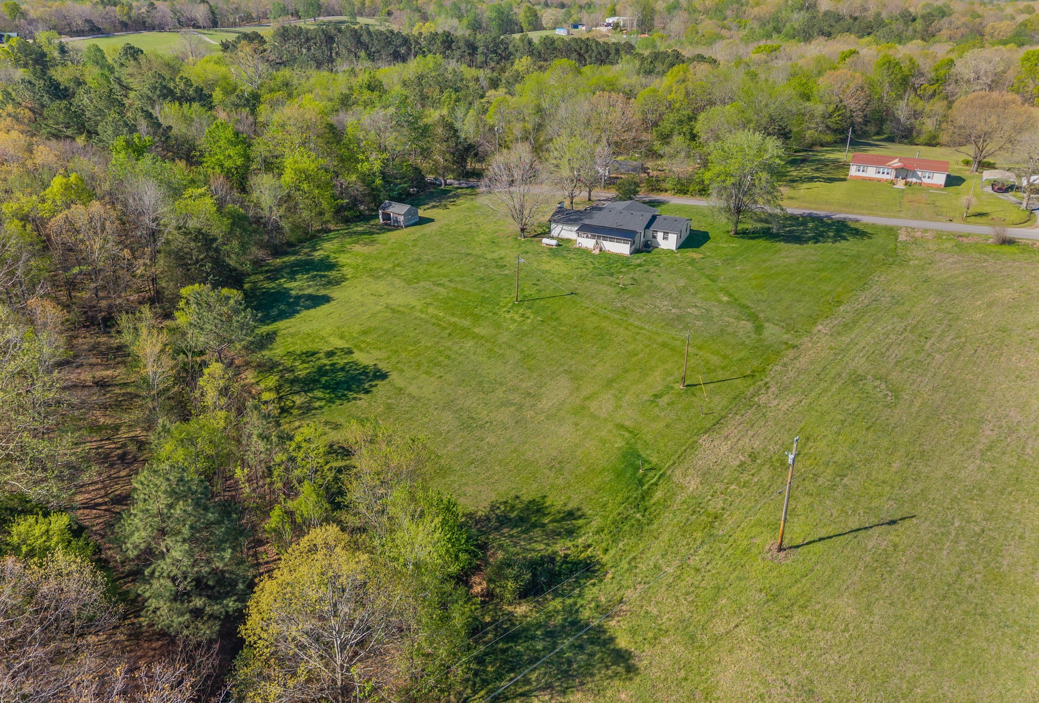 138 Walker Ridge Road Big Rock, TN 37023 - Photo 36 of 37 a backyard of a house with a yard and lake view