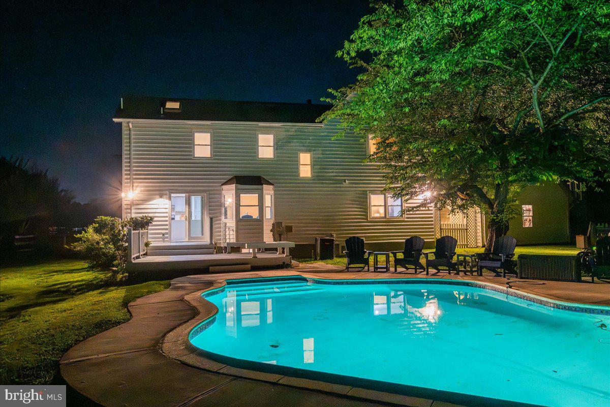 11057 Bishopsgate Court Reston, VA 20194 - Photo 50 of 72 Stunning evening view of the lighted pool