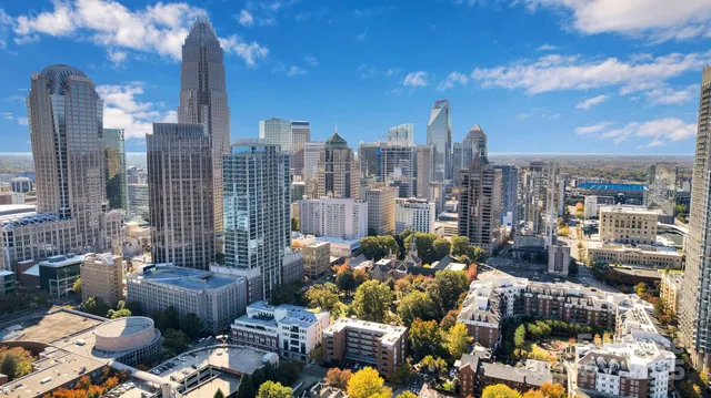 a view of a street with a building in the background