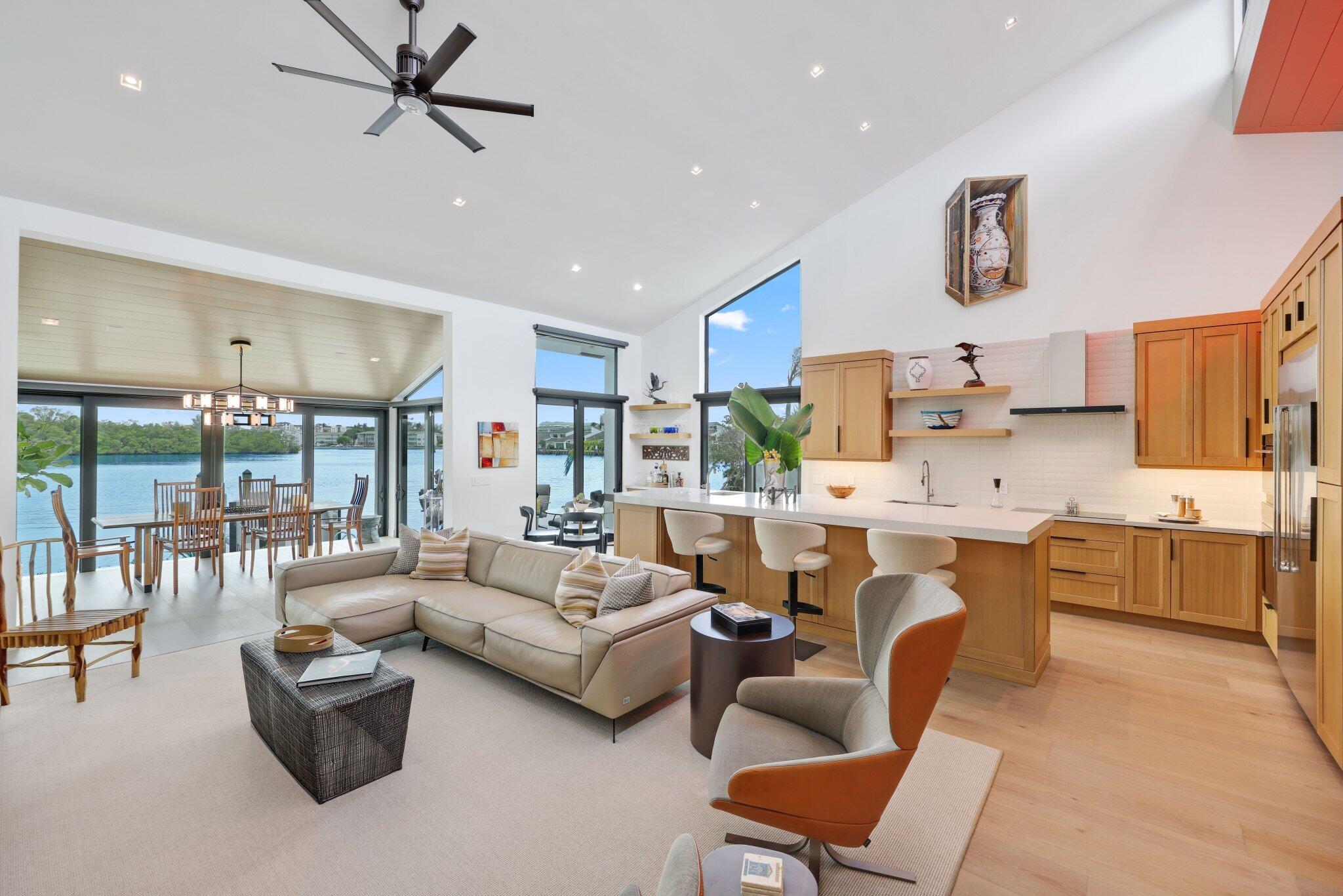 6110 North Ocean Boulevard, Unit 39 Ocean Ridge, FL 33435 - Photo 12 of 59 a living room with furniture and a large window