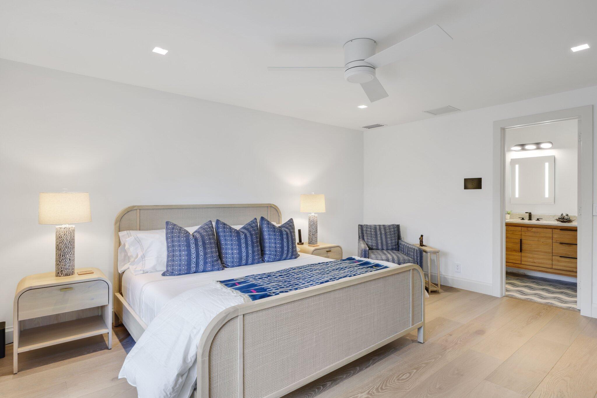 6110 North Ocean Boulevard, Unit 39 Ocean Ridge, FL 33435 - Photo 34 of 59 a bedroom with a bed and dresser