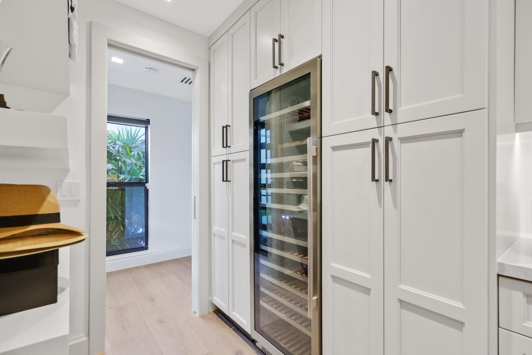 6110 North Ocean Boulevard, Unit 39 Ocean Ridge, FL 33435 - Photo 39 of 59 a view of walk in closet with clothes