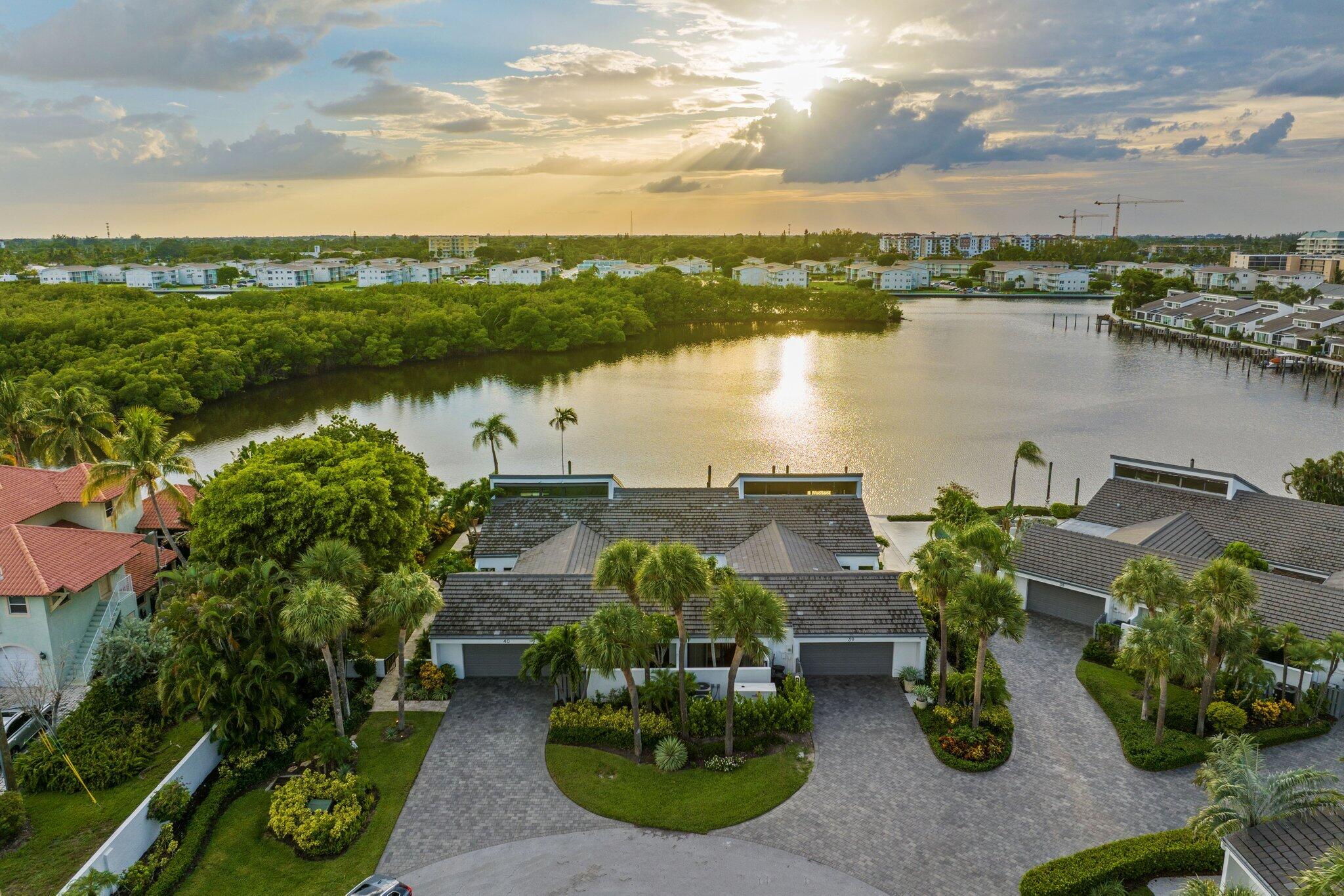 6110 North Ocean Boulevard, Unit 39 Ocean Ridge, FL 33435 - Photo 43 of 59 an aerial view of lake and houses with outdoor space