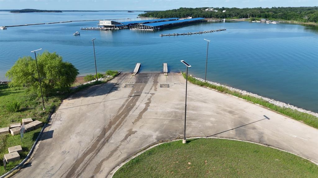 125 Maverick Lane Pilot Point, TX 76258 - Photo 26 of 28 Concrete boat ramp providing direct access to the expansive body of water