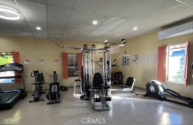 70201 Aurora Road, Unit 176 Desert Hot Springs, CA 92240 - Photo 13 of 17 a view of a room with gym equipment