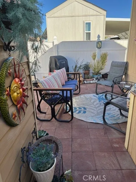 70201 Aurora Road, Unit 176 Desert Hot Springs, CA 92241 - Photo 3 of 17 a view of a chairs and tables in the patio
