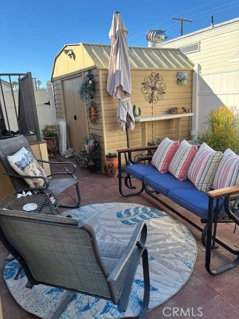 70201 Aurora Road, Unit 176 Desert Hot Springs, CA 92240 - Photo 4 of 17 a living room with furniture and wooden floor