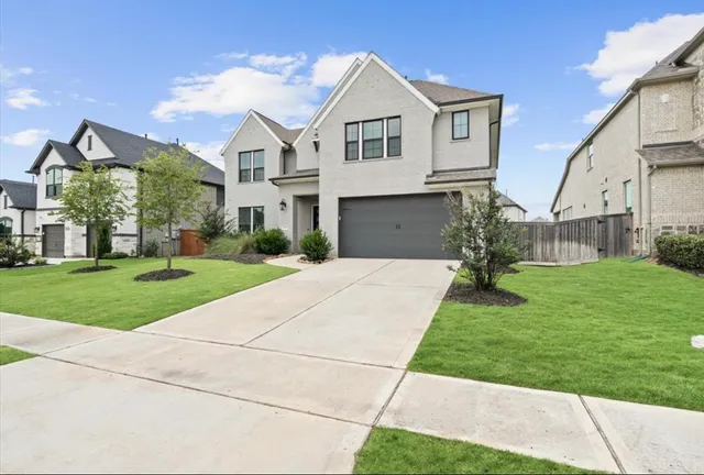 a front view of house with yard