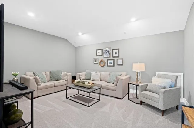 a living room with furniture and a couch