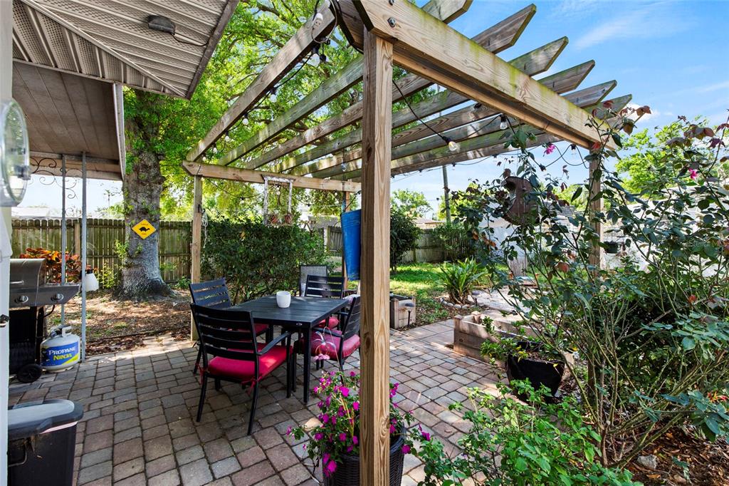 1361 Belleair Road Clearwater, FL 33756 - Photo 12 of 19 a view of a chairs and table in the patio