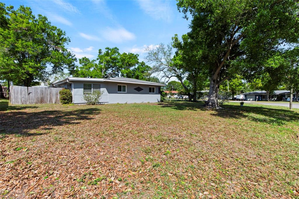 1361 Belleair Road Clearwater, FL 33756 - Photo 15 of 19 a view of a house with a yard